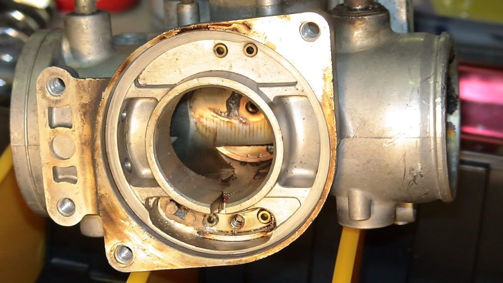 Raw fuel pouring from overflow tube and between the carbs Honda CX